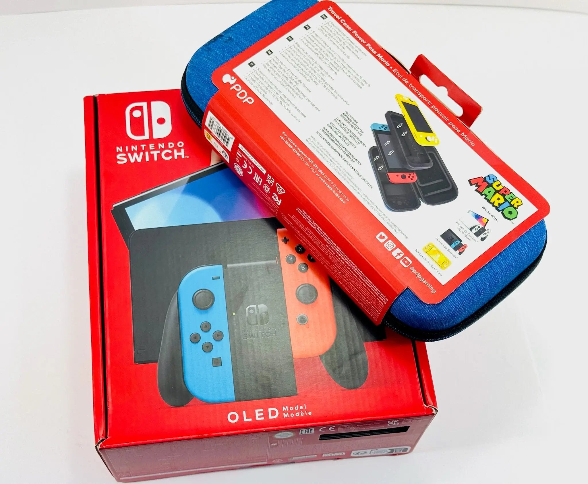 Nintendo Switch OLED + Funda Oficial Super Mario